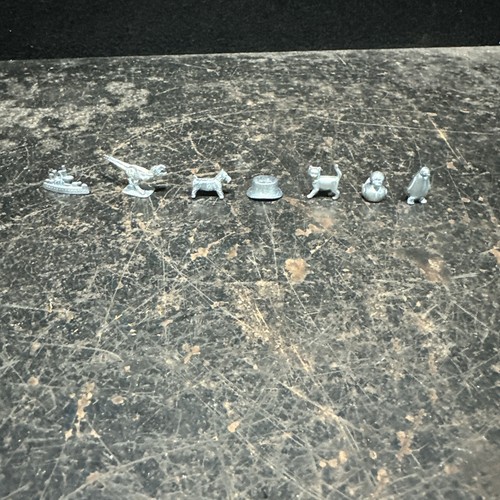 Metal playing tokens from - 7,